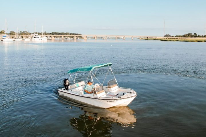 a small boat in a body of water