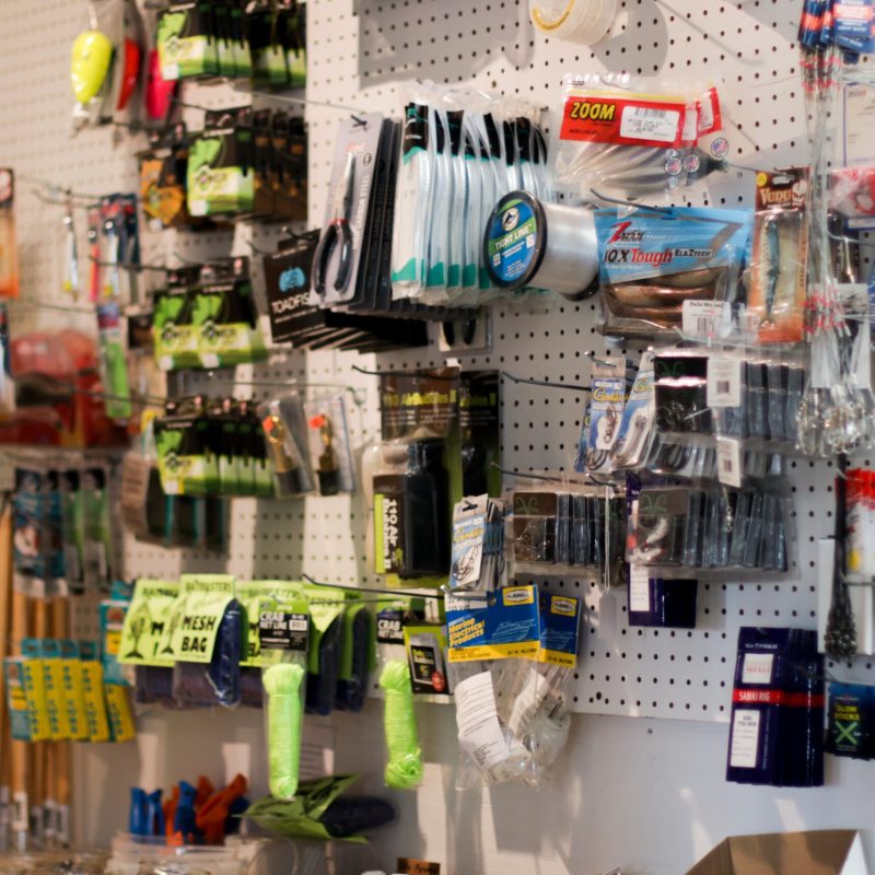 a bottle next to a refrigerator
